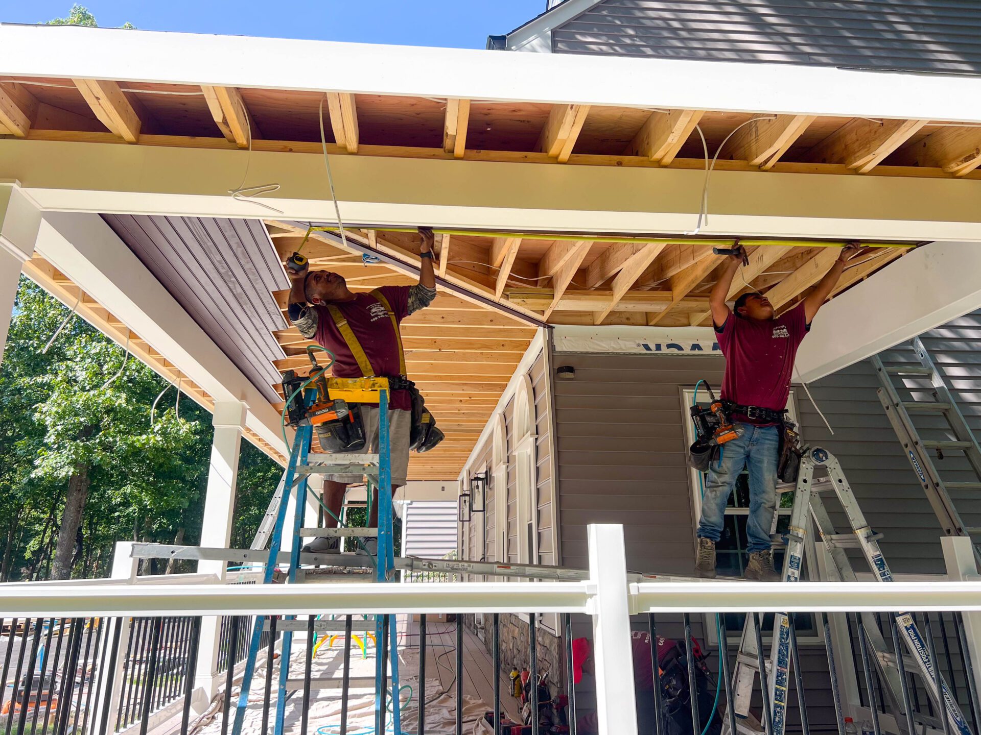 ml roofing and siding carpenters installing soffit house front side